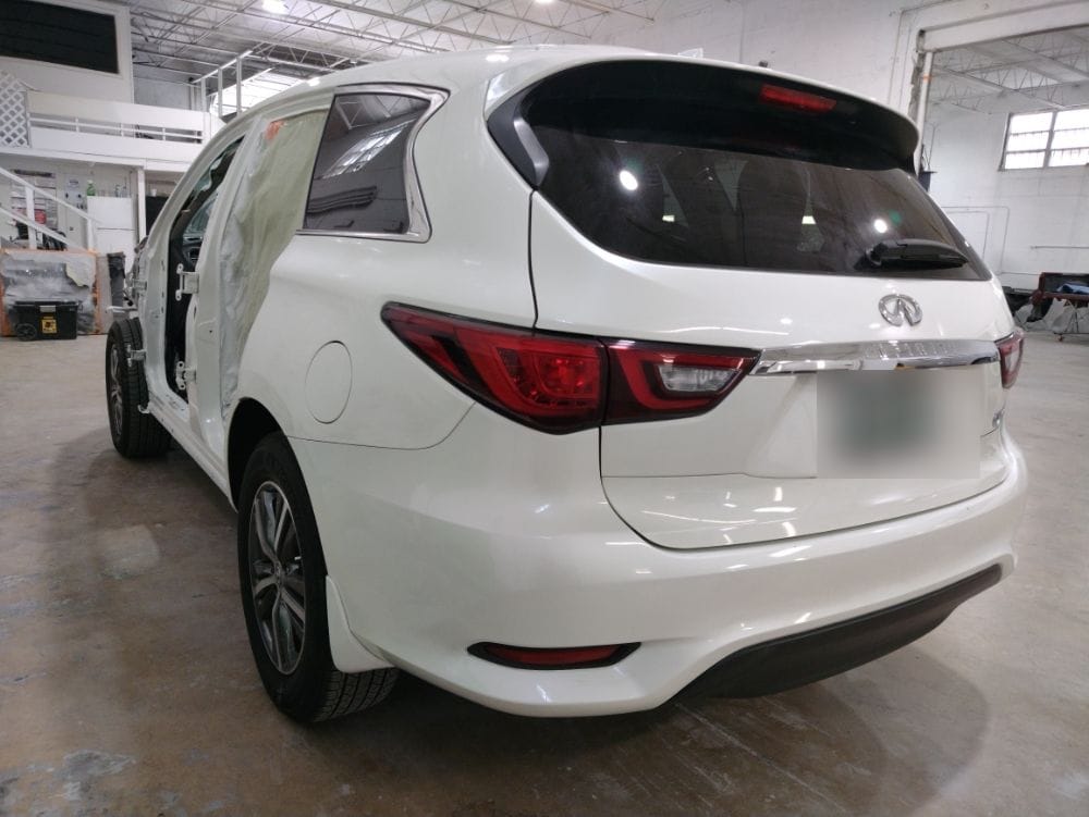 White Infiniti QX60 rear repaired